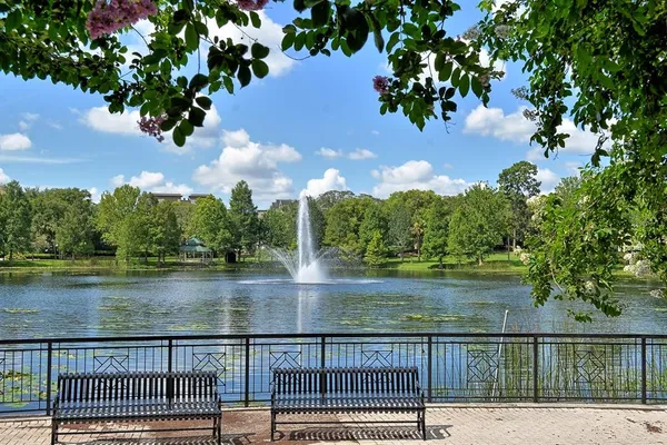 a view of a lake with a yard