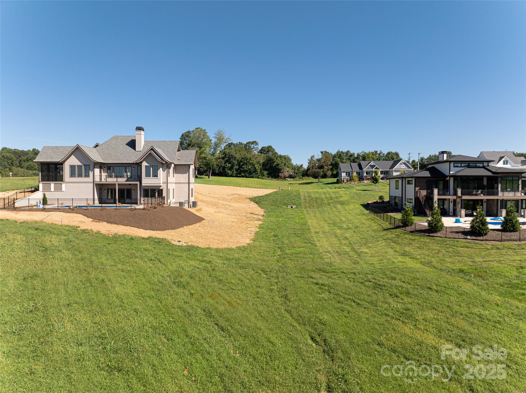 108 Double Knob Road, Unit 65 Mills River, NC 28759 - Photo 6 of 9 a front view of a house with a yard