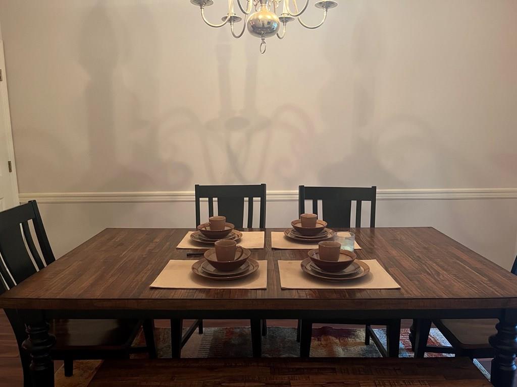 2250 15th Street, Unit 7 Columbus, GA 31906 - Photo 3 of 14 a view of a dining room with furniture and wooden floor