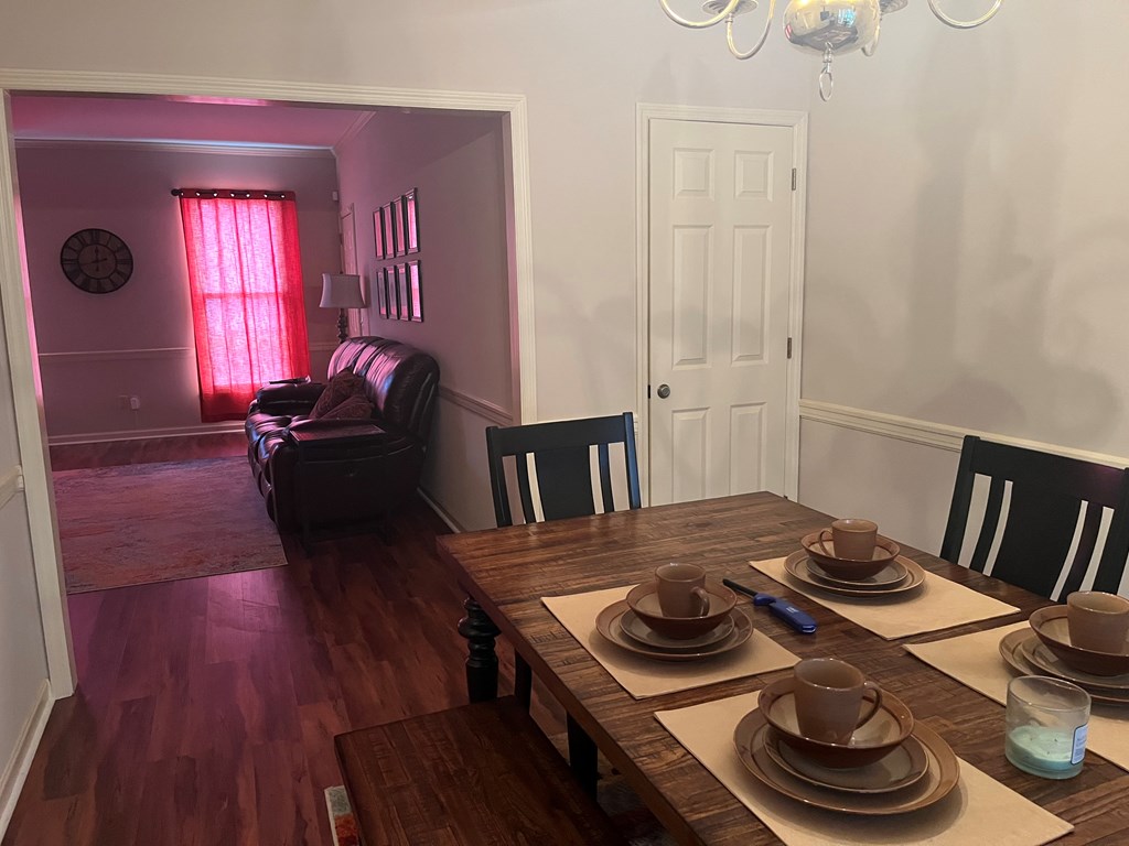 2250 15th Street, Unit 7 Columbus, GA 31906 - Photo 6 of 14 a living room with furniture and a wooden floor