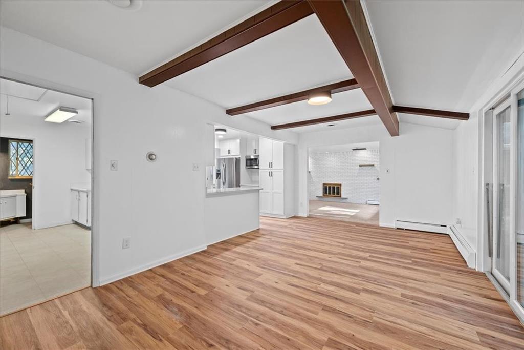 233 Sunset Drive Pittsburgh, PA 15235 - Photo 20 of 48 a bedroom with a bed and a window