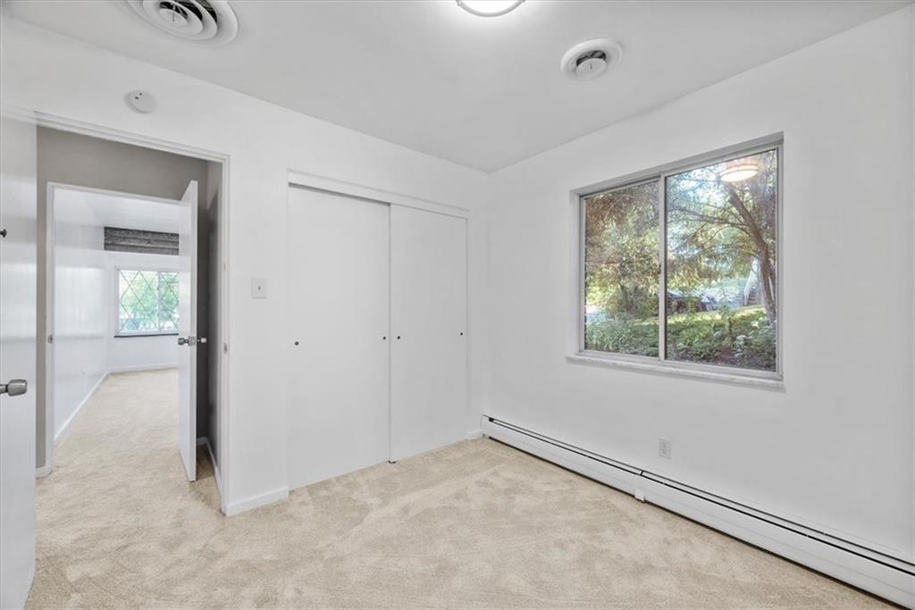 233 Sunset Drive Pittsburgh, PA 15235 - Photo 33 of 48 an empty room with windows