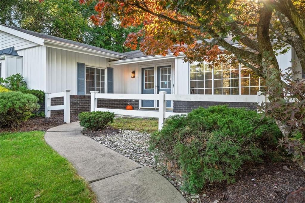 233 Sunset Drive Pittsburgh, PA 15235 - Photo 4 of 48 front view of a house with a yard