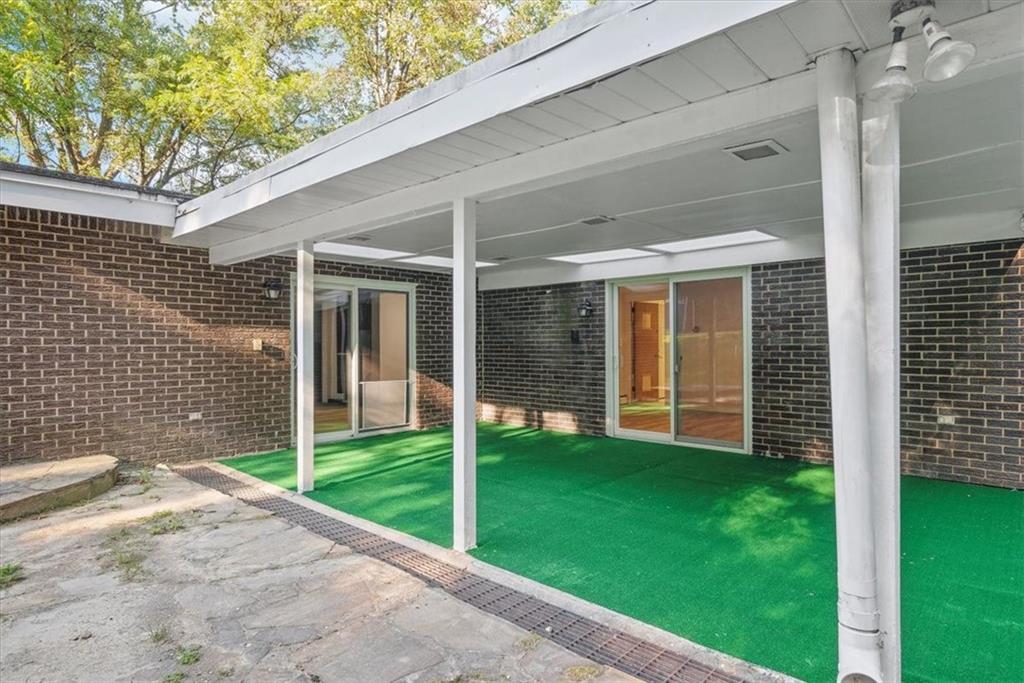 233 Sunset Drive Pittsburgh, PA 15235 - Photo 42 of 48 a backyard of a house with seating and garden