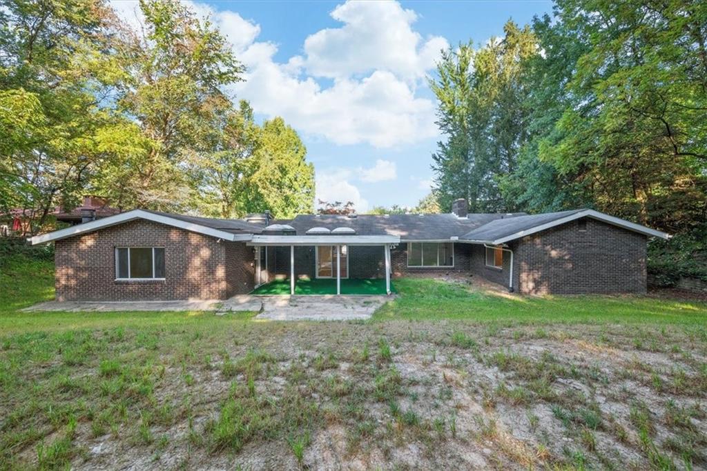 233 Sunset Drive Pittsburgh, PA 15235 - Photo 45 of 48 a front view of a house with a yard and trees