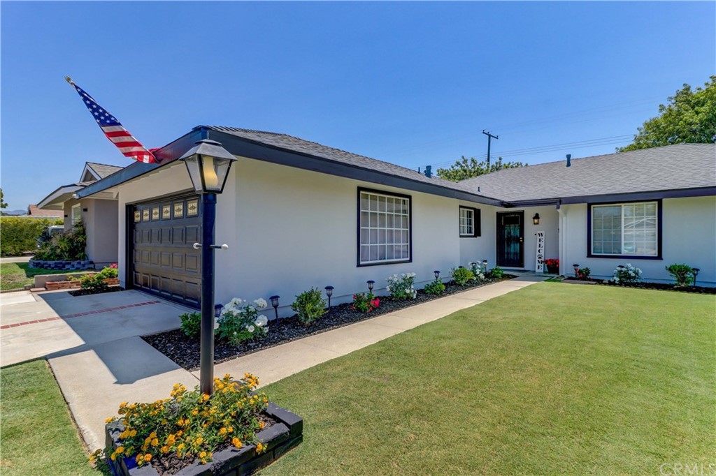 23072 Cavanaugh Road Lake Forest, CA 92630 - Photo 1 of 1 Three car driveway and immaculate yard!
