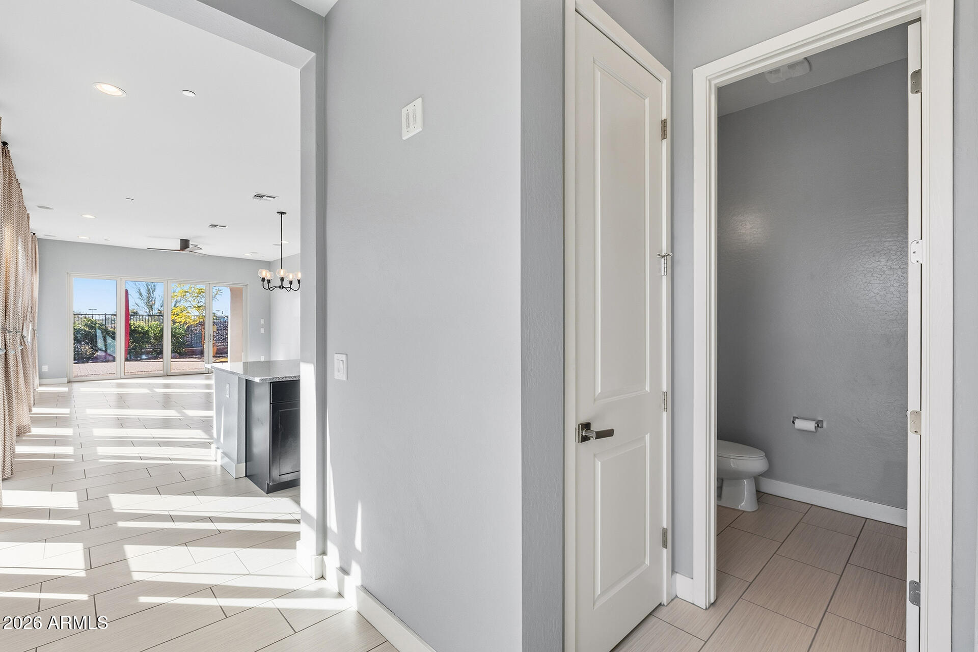12035 West Roy Rogers Road Peoria, AZ 85383 - Photo 18 of 46 a view of a bathroom from the hallway