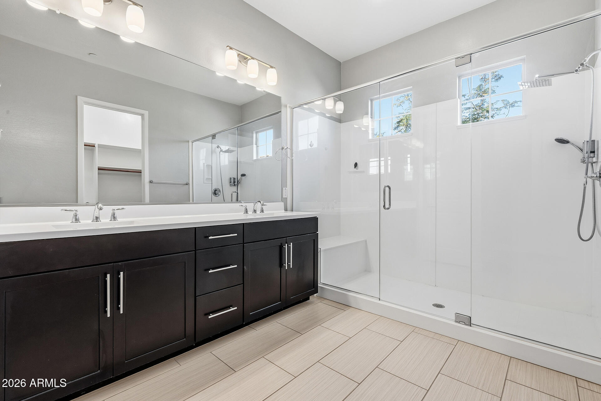 12035 West Roy Rogers Road Peoria, AZ 85383 - Photo 37 of 46 a bathroom with a double vanity sink mirror and double