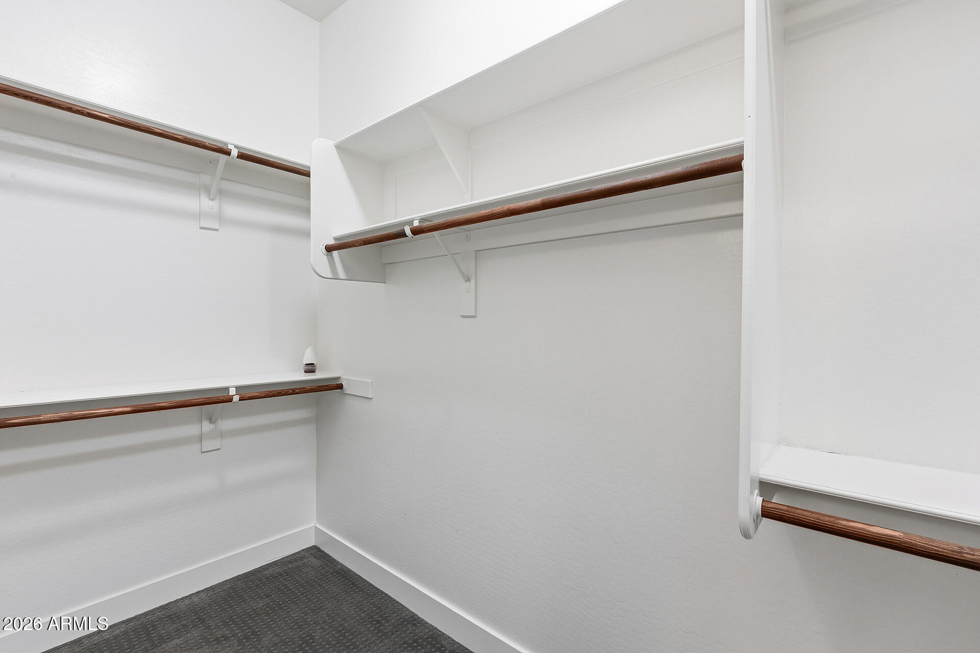 12035 West Roy Rogers Road Peoria, AZ 85383 - Photo 38 of 46 a view of an empty walk in closet