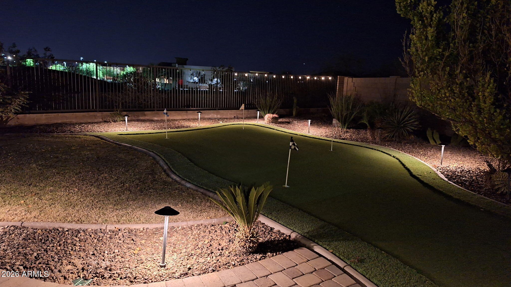 12035 West Roy Rogers Road Peoria, AZ 85383 - Photo 45 of 46 a view of a swimming pool with an outdoor seating and mountain view