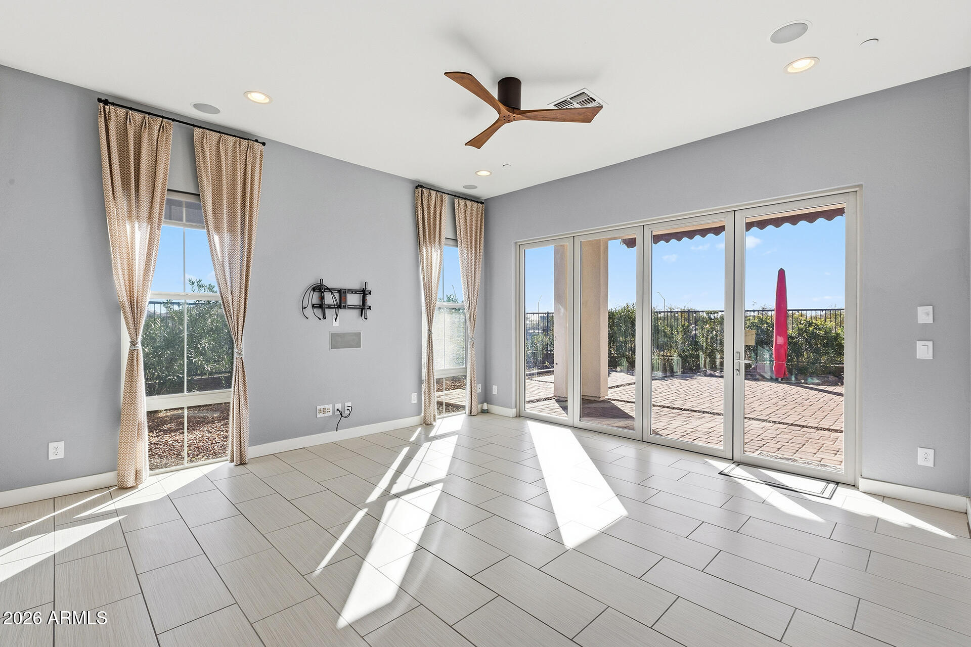 12035 West Roy Rogers Road Peoria, AZ 85383 - Photo 4 of 46 a view of a livingroom with a furniture and floor to ceiling window