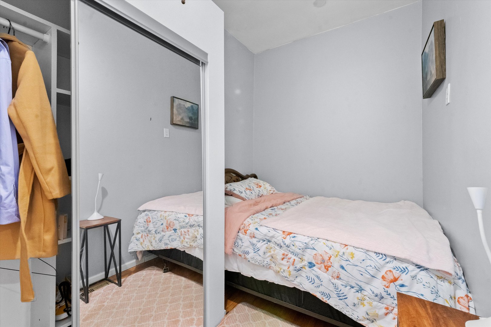 2129 West 18th Place Chicago, IL 60608 - Photo 20 of 38 a bedroom with a bed and a mirror