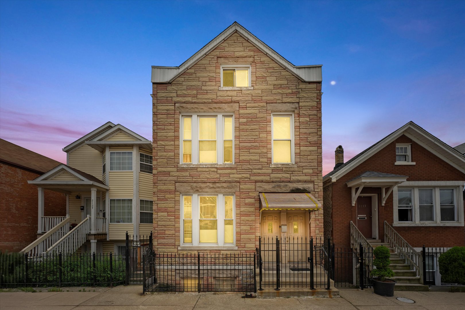 2129 West 18th Place Chicago, IL 60608 - Photo 2 of 38 a front view of a house
