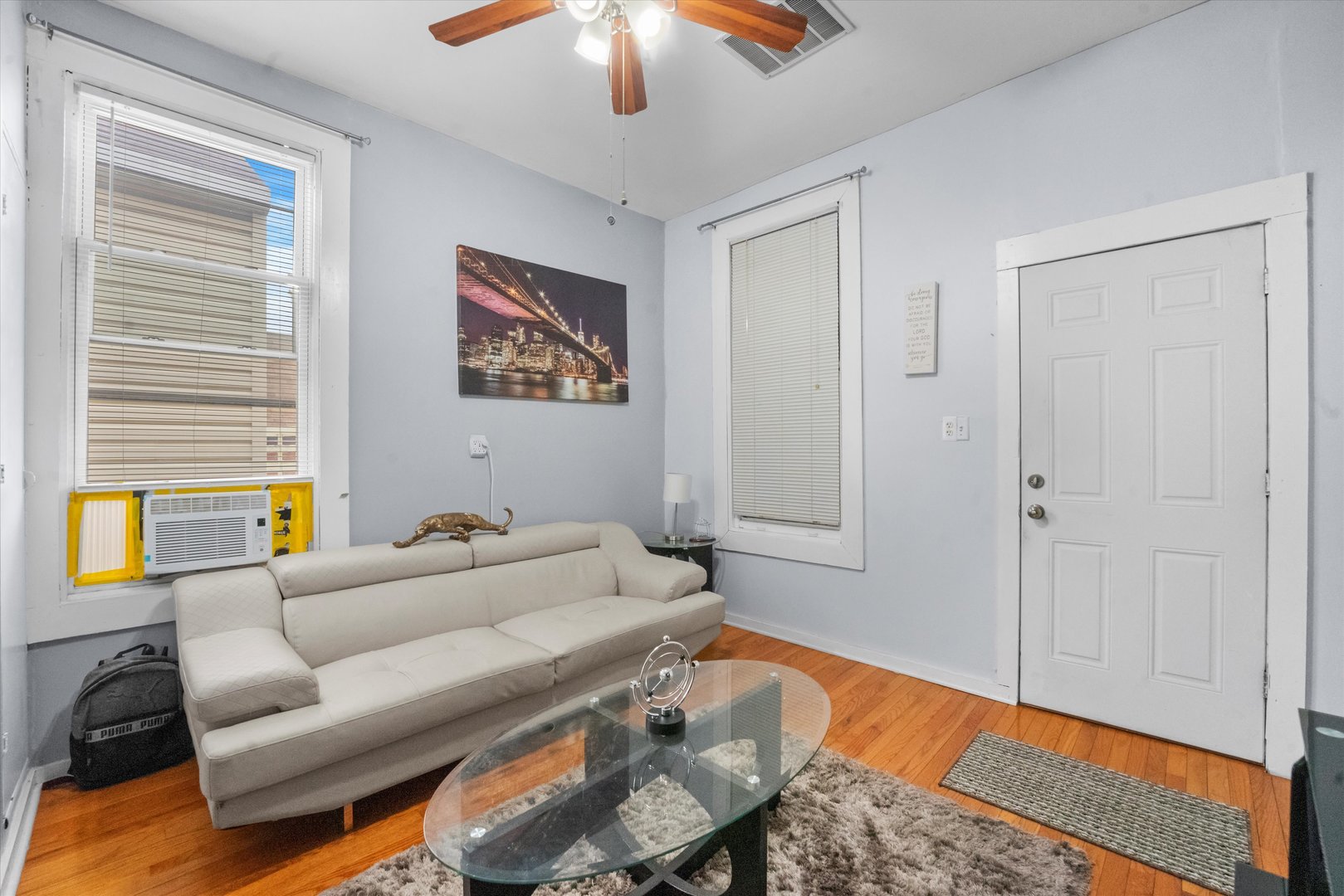 2129 West 18th Place Chicago, IL 60608 - Photo 22 of 38 a living room with furniture and a window