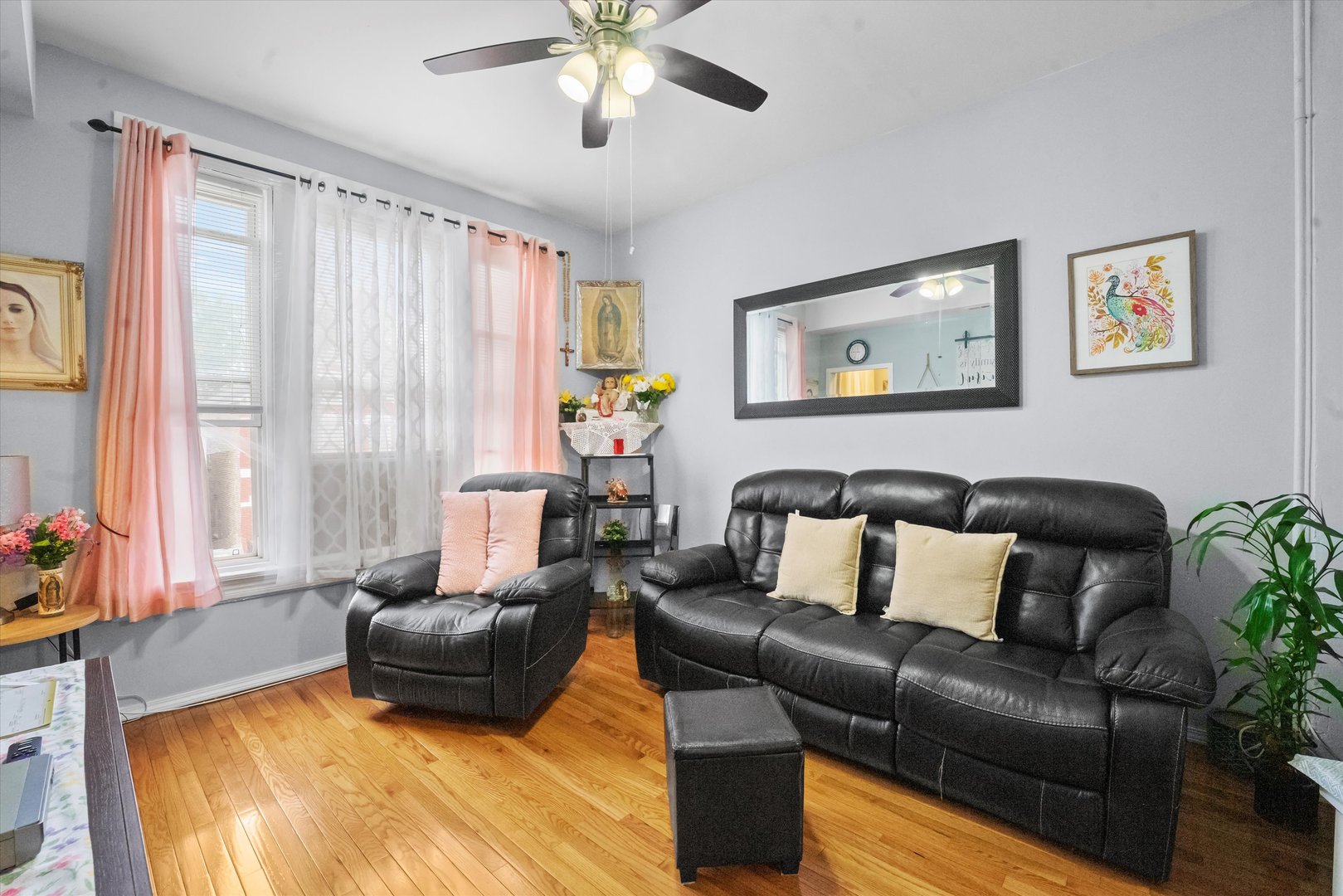 2129 West 18th Place Chicago, IL 60608 - Photo 3 of 38 a living room with furniture and a large window