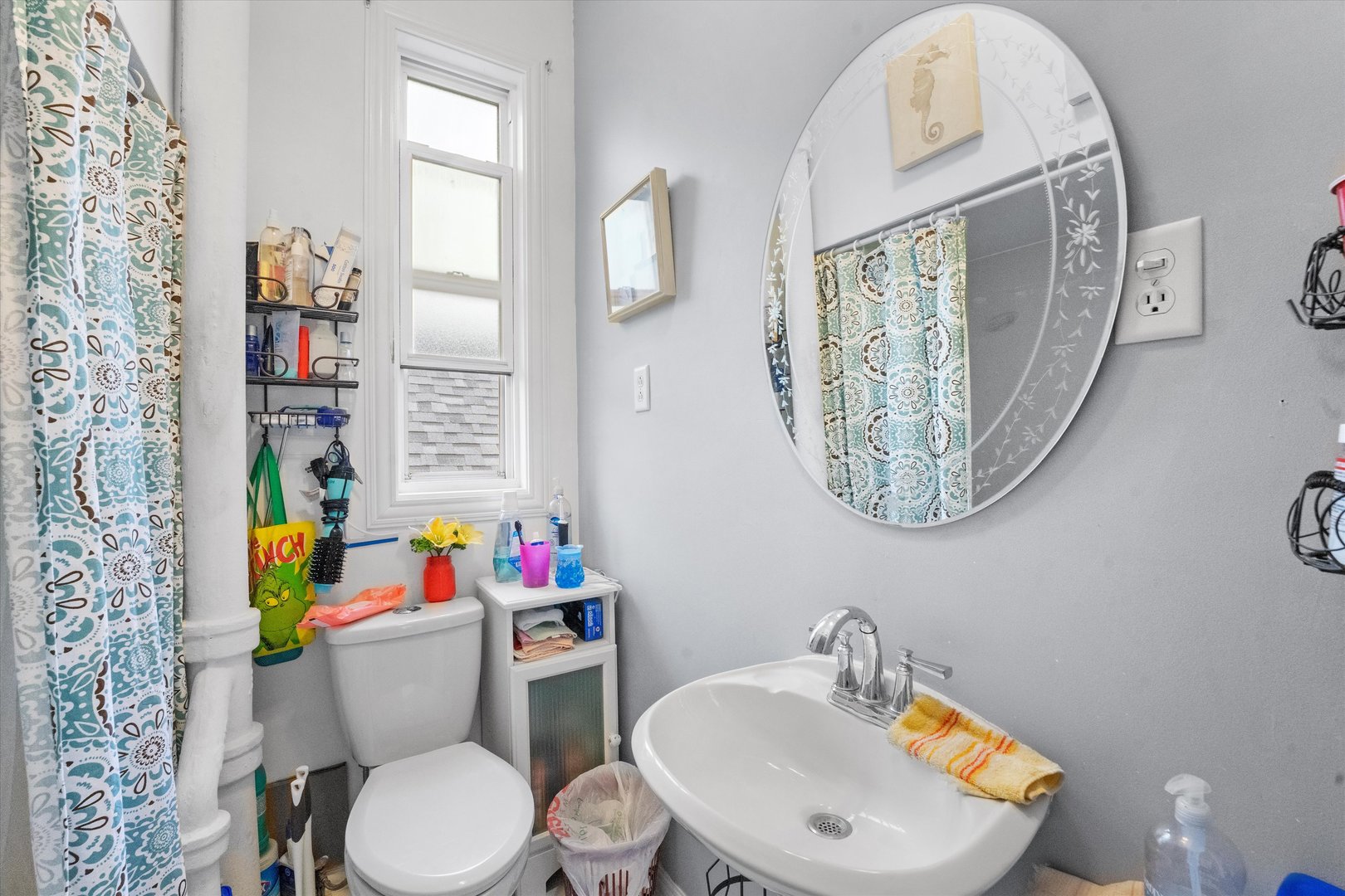 2129 West 18th Place Chicago, IL 60608 - Photo 10 of 38 a bathroom with a toilet a sink and a mirror