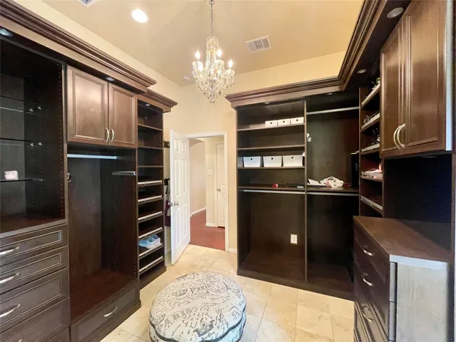 a kitchen with a refrigerator and a sink