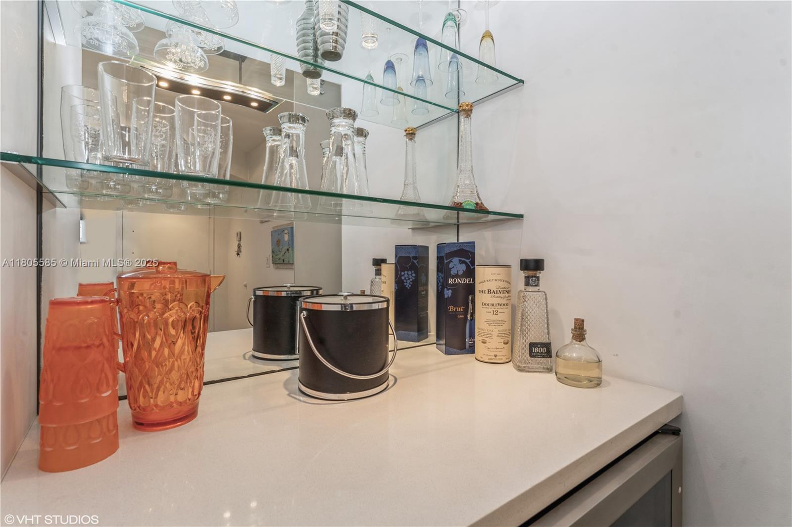 170 Ocean Ln Drive, Unit 906 Key Biscayne, FL 33149 - Photo 13 of 26 a utility room with multiple dryer and washer