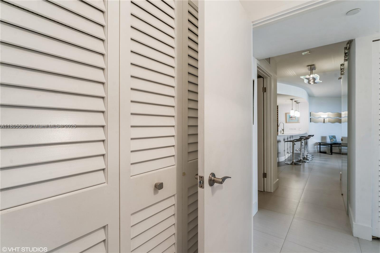 170 Ocean Ln Drive, Unit 906 Key Biscayne, FL 33149 - Photo 22 of 26 a view of a living room and utility room