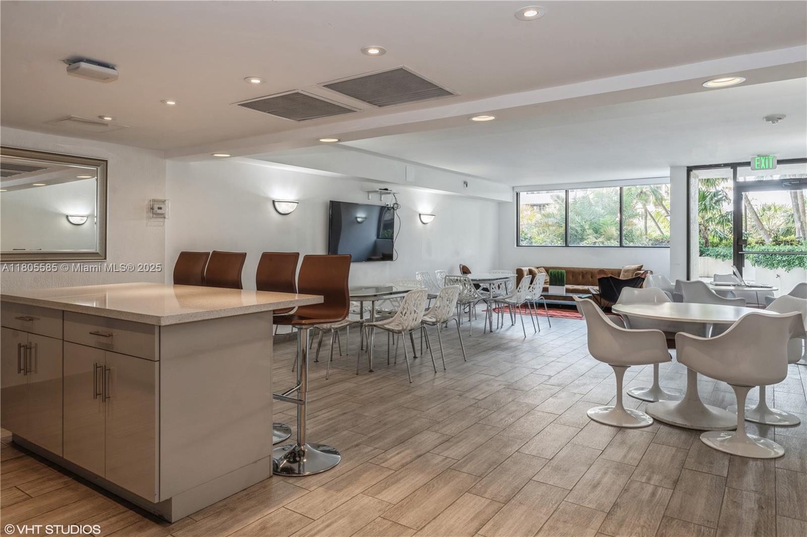170 Ocean Ln Drive, Unit 906 Key Biscayne, FL 33149 - Photo 24 of 26 a living room with furniture and a wooden floor