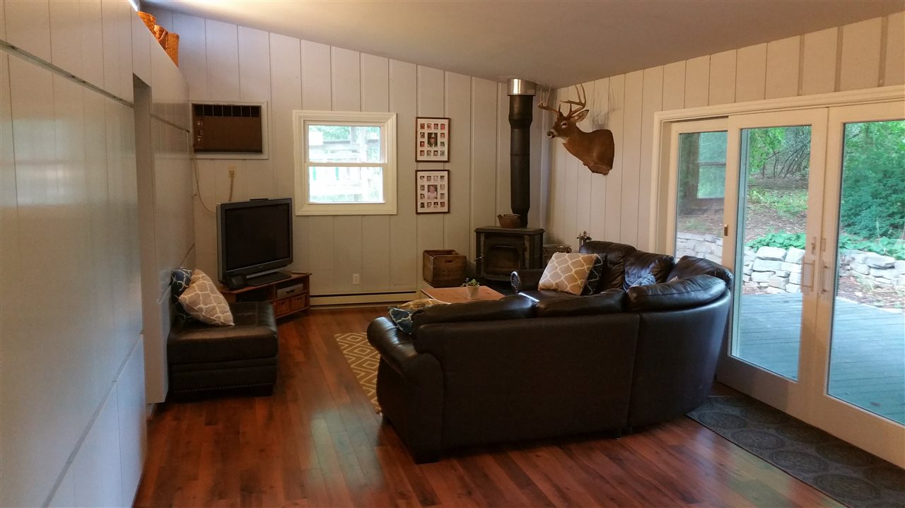145 Free Mason Run Road Mount Solon, VA 22843 - Photo 11 of 37 a living room with furniture and a flat screen tv
