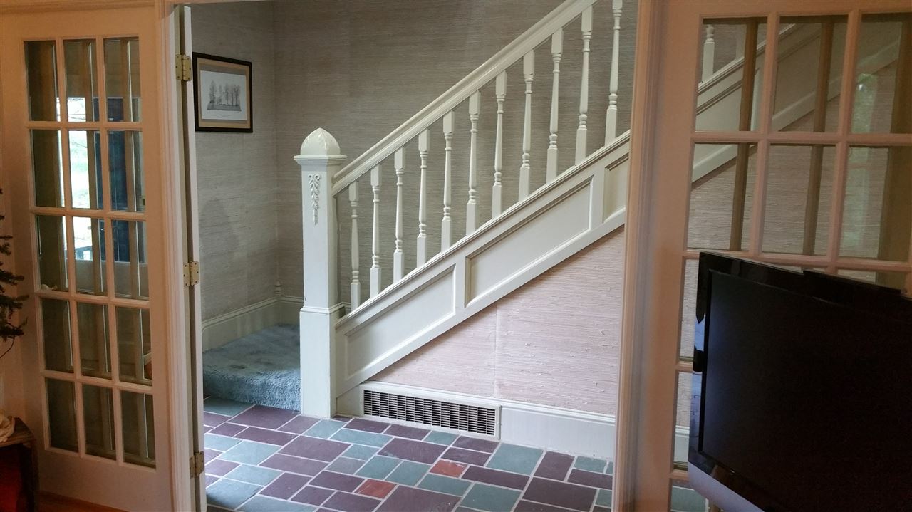 145 Free Mason Run Road Mount Solon, VA 22843 - Photo 15 of 37 a view of staircase with lots of frames on wall and a window