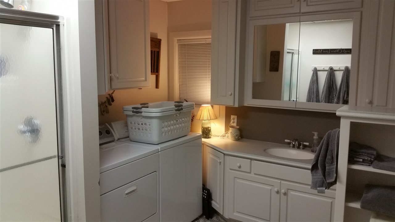 145 Free Mason Run Road Mount Solon, VA 22843 - Photo 7 of 37 a bathroom with a toilet sink and mirror