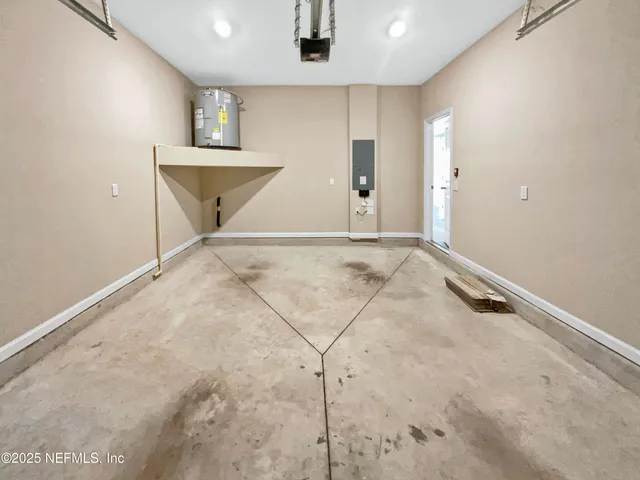 a view of a room with storage and racks on wall