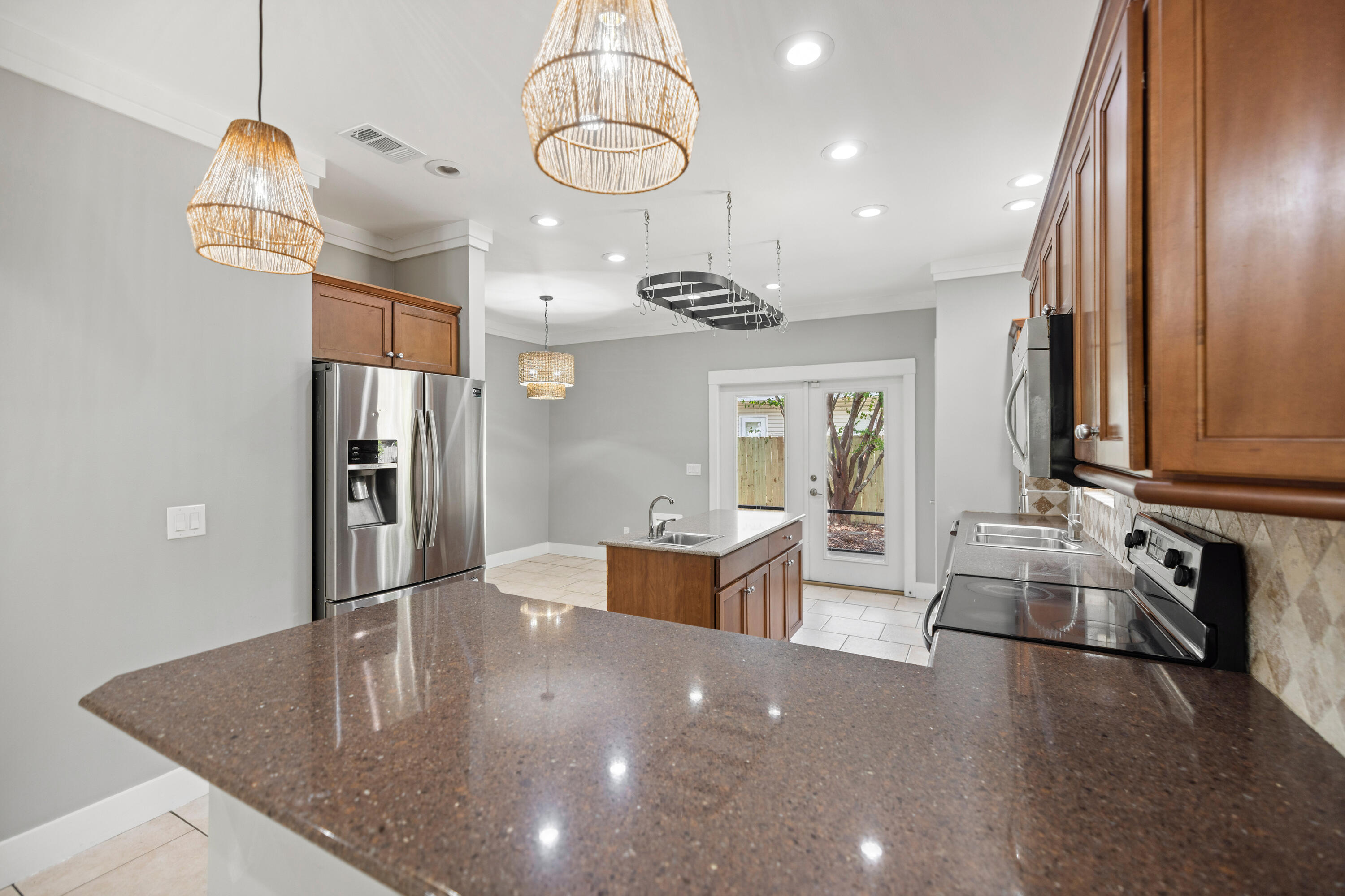 42 Pritchard Road Miramar Beach, FL 32550 - Photo 12 of 51 a kitchen with counter top space cabinets and stainless steel appliances