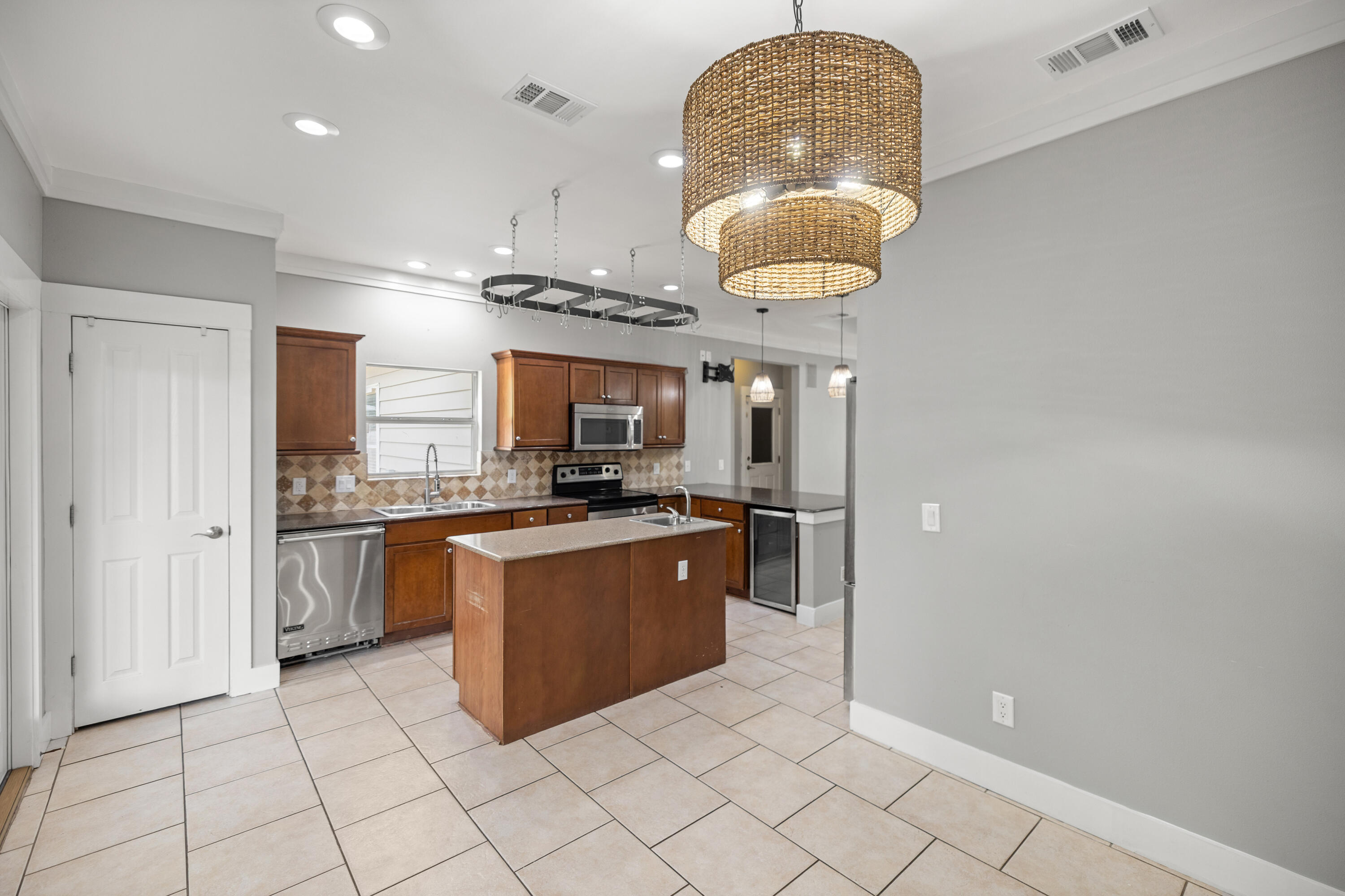 42 Pritchard Road Miramar Beach, FL 32550 - Photo 18 of 51 a kitchen with stainless steel appliances granite countertop a sink and cabinets