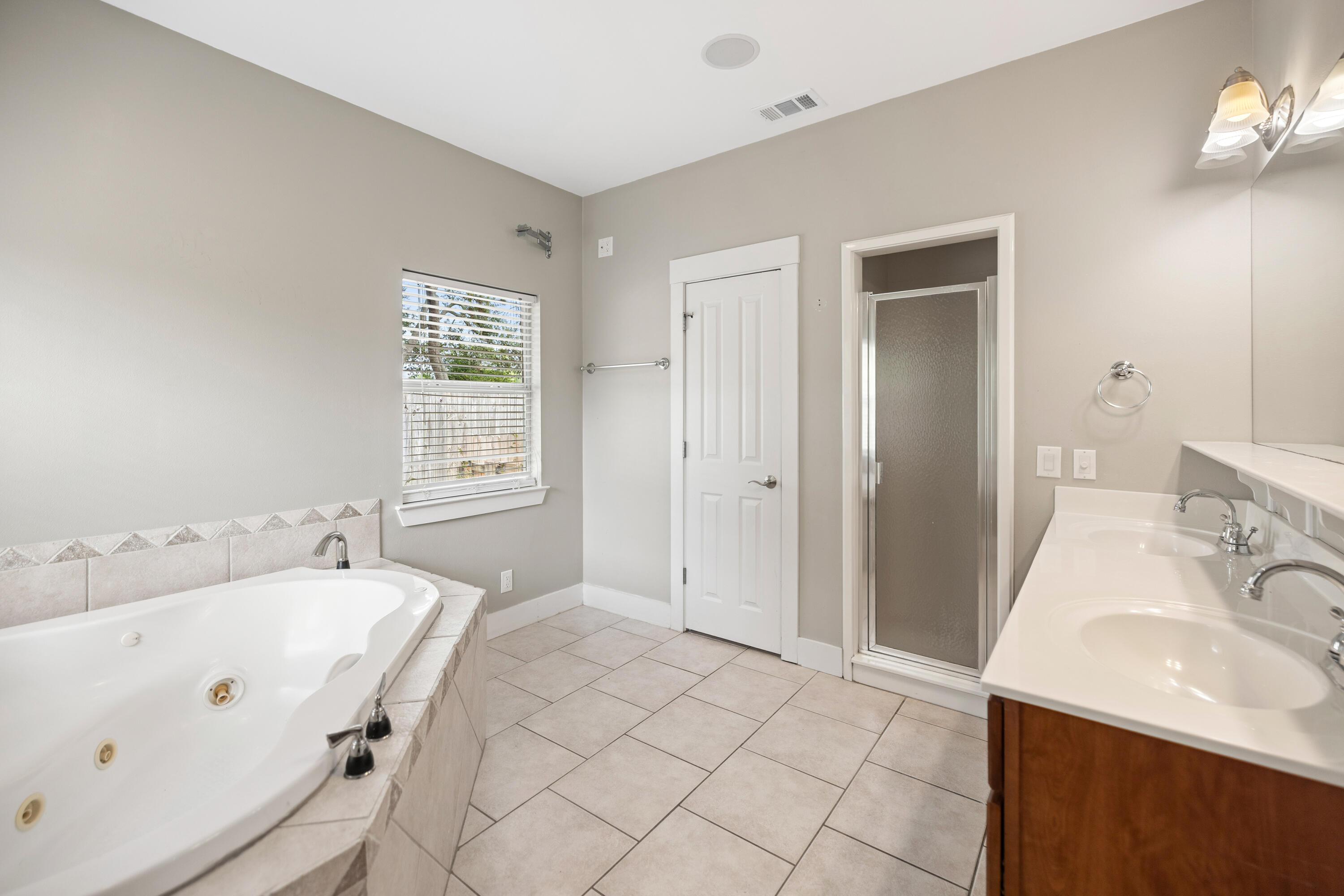 42 Pritchard Road Miramar Beach, FL 32550 - Photo 21 of 51 a bathroom with a tub sink and mirror