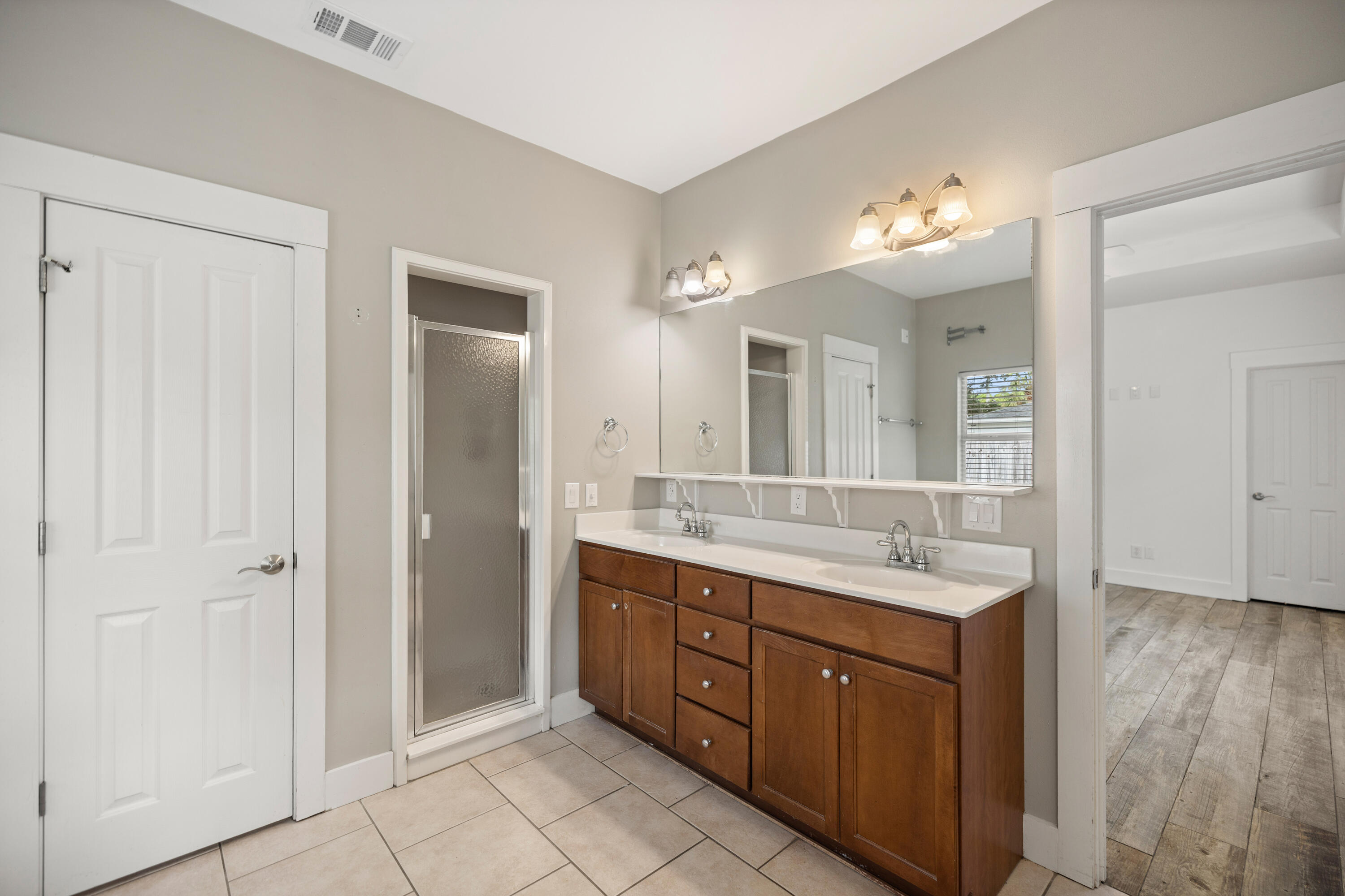 42 Pritchard Road Miramar Beach, FL 32550 - Photo 23 of 51 a spacious bathroom with a double vanity sink a mirror and a