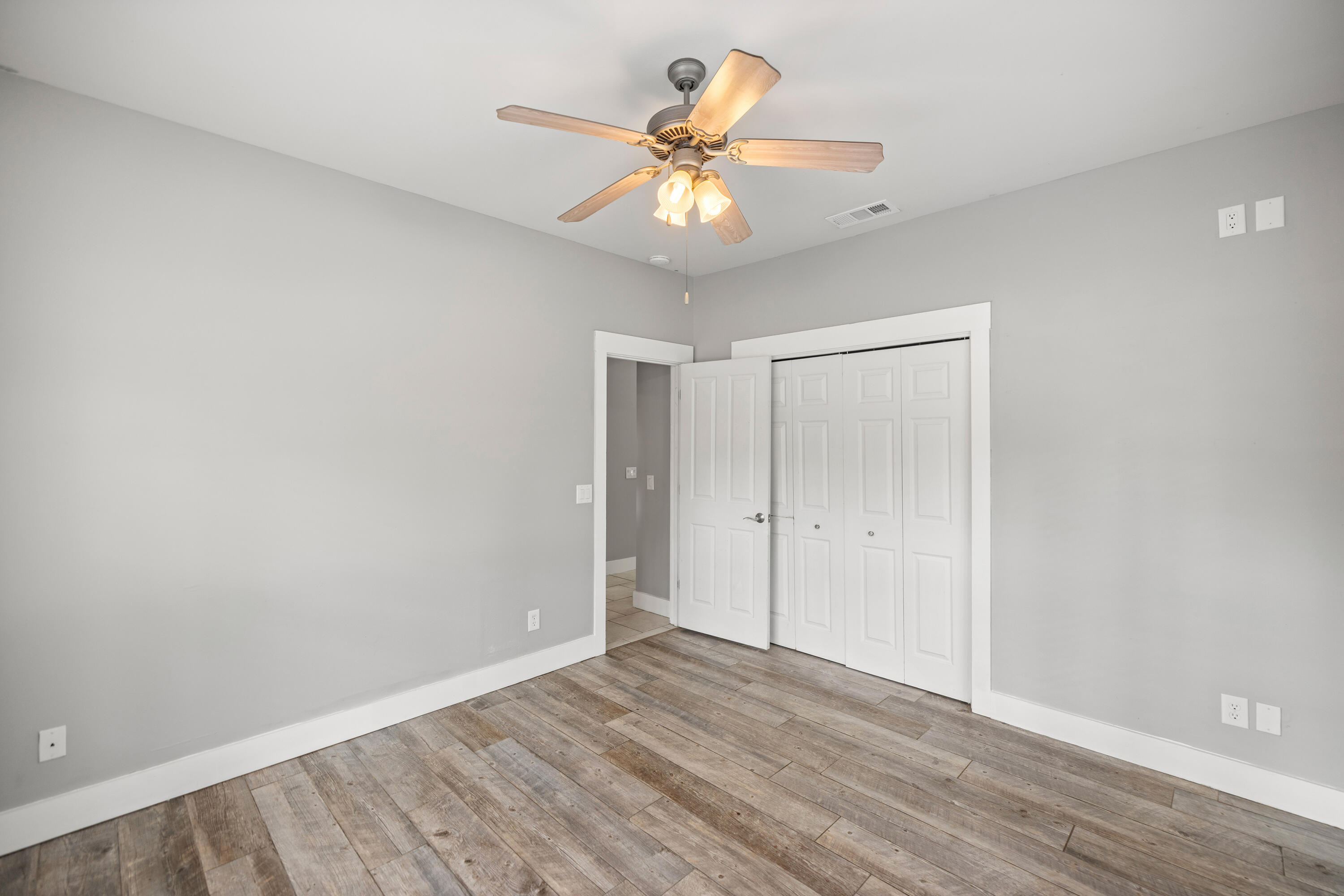 42 Pritchard Road Miramar Beach, FL 32550 - Photo 36 of 51 wooden floor in an empty room with a window
