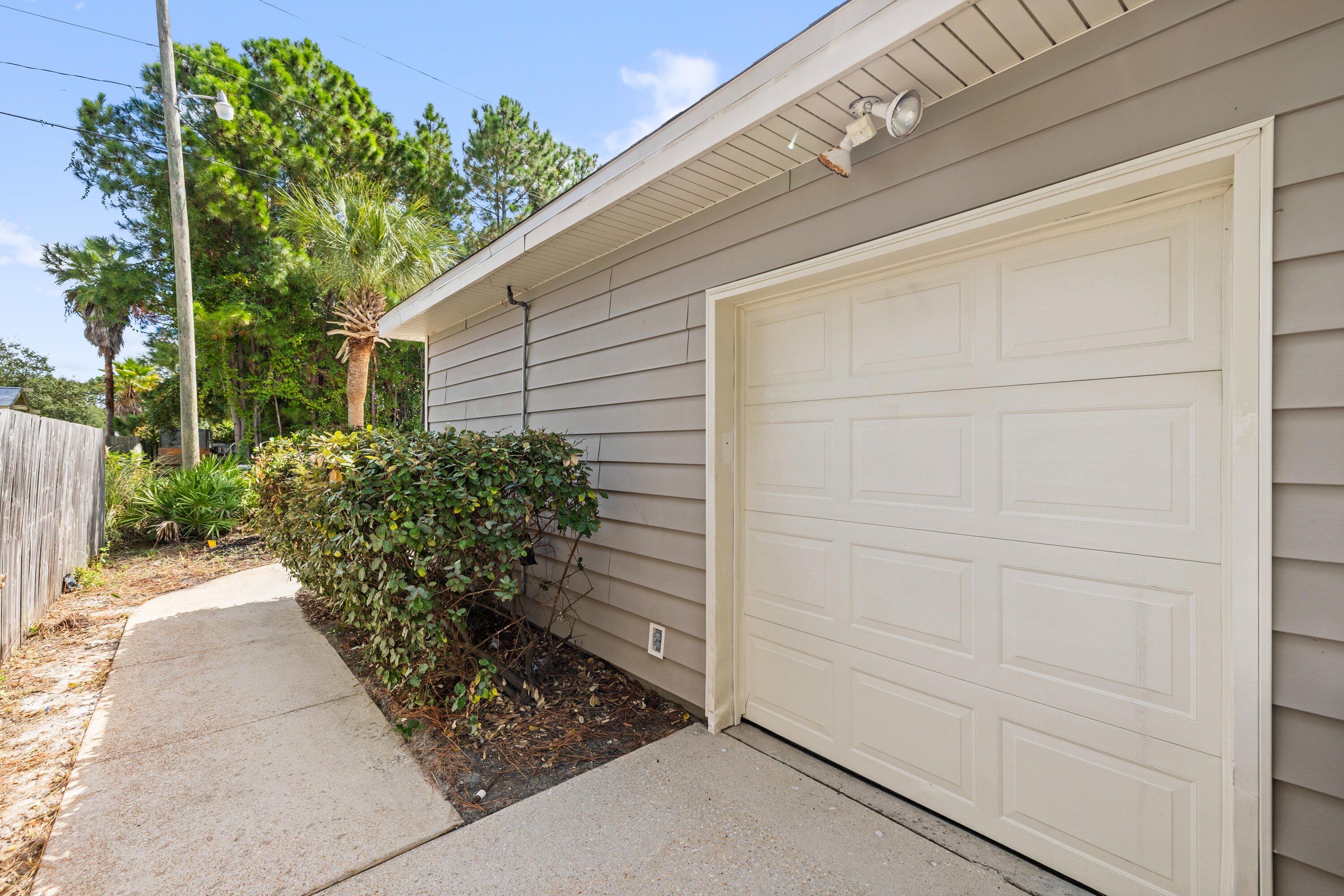 42 Pritchard Road Miramar Beach, FL 32550 - Photo 40 of 51 a view of a house with a garden