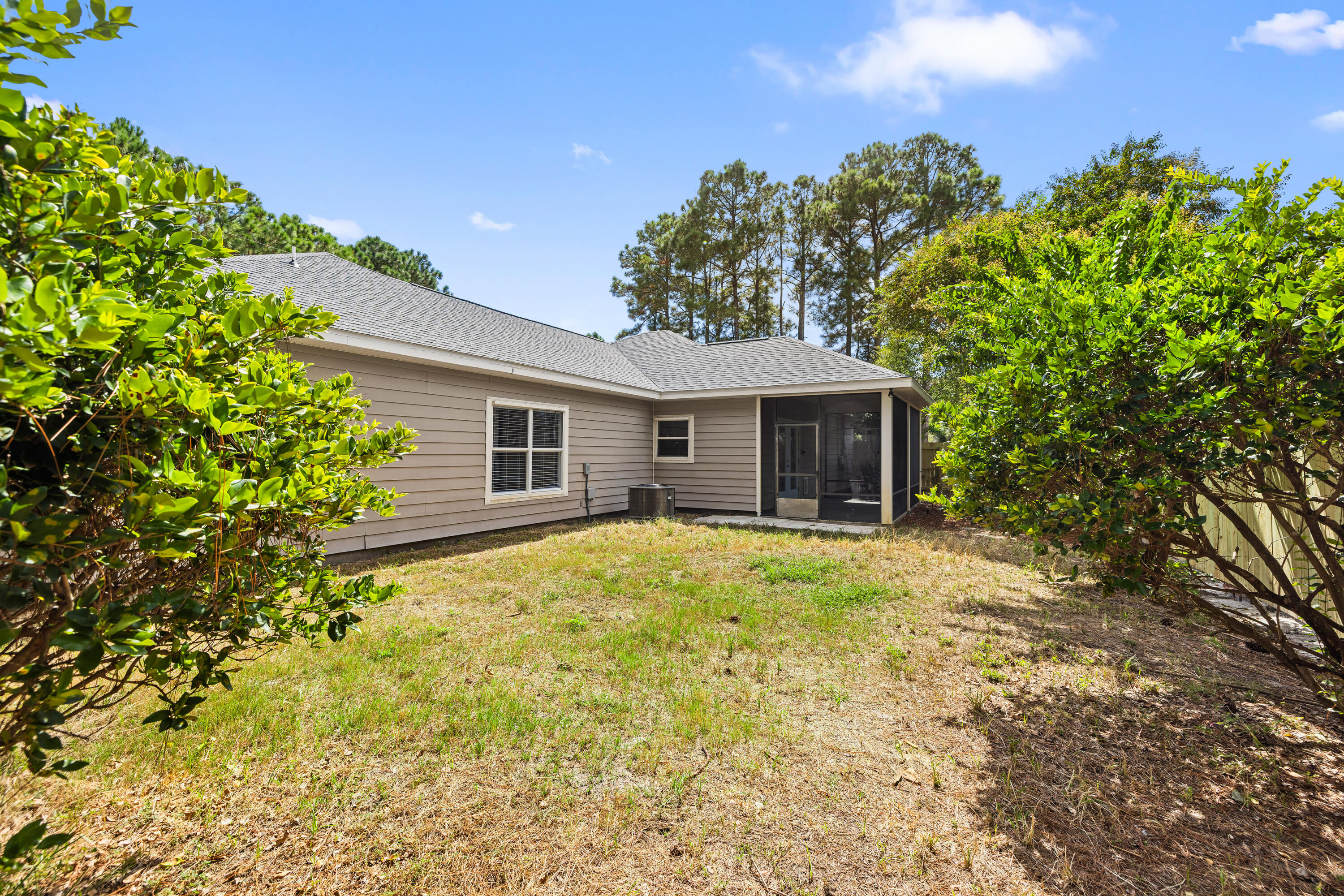 42 Pritchard Road Miramar Beach, FL 32550 - Photo 41 of 51 a front view of a house with a garden