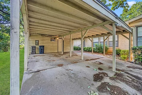 a view of a house with a street
