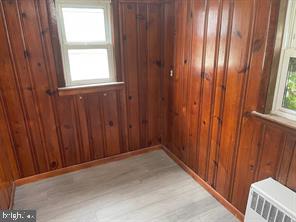 429 Jackson Avenue, Unit H Magnolia, NJ 08049 - Photo 6 of 8 a view of an entryway with wooden walls