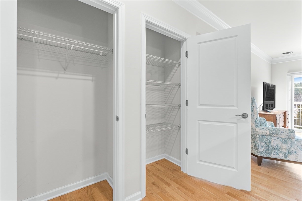 36 Abigail Way, Unit 3003 Reading, MA 01867 - Photo 13 of 42 a view of bedroom with wooden floor