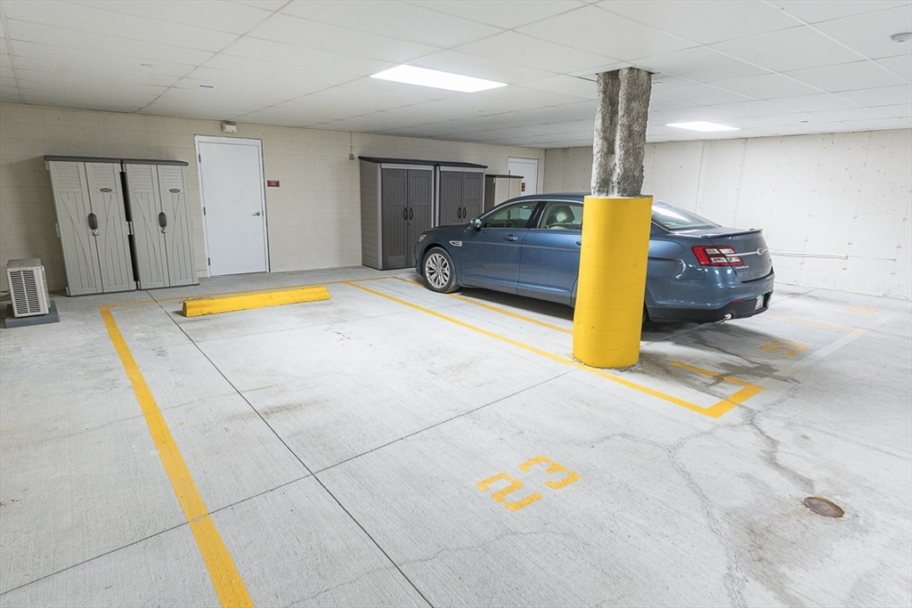 36 Abigail Way, Unit 3003 Reading, MA 01867 - Photo 34 of 42 a swimming pool with a barbeque