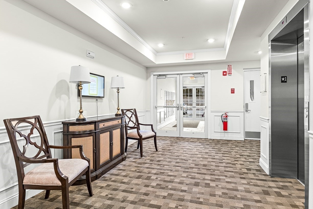 36 Abigail Way, Unit 3003 Reading, MA 01867 - Photo 7 of 42 a living room with furniture