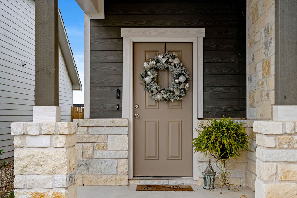 2417 Roosevelt Road Leander, TX 78641 - Photo 35 of 40 Property entrance with stone siding