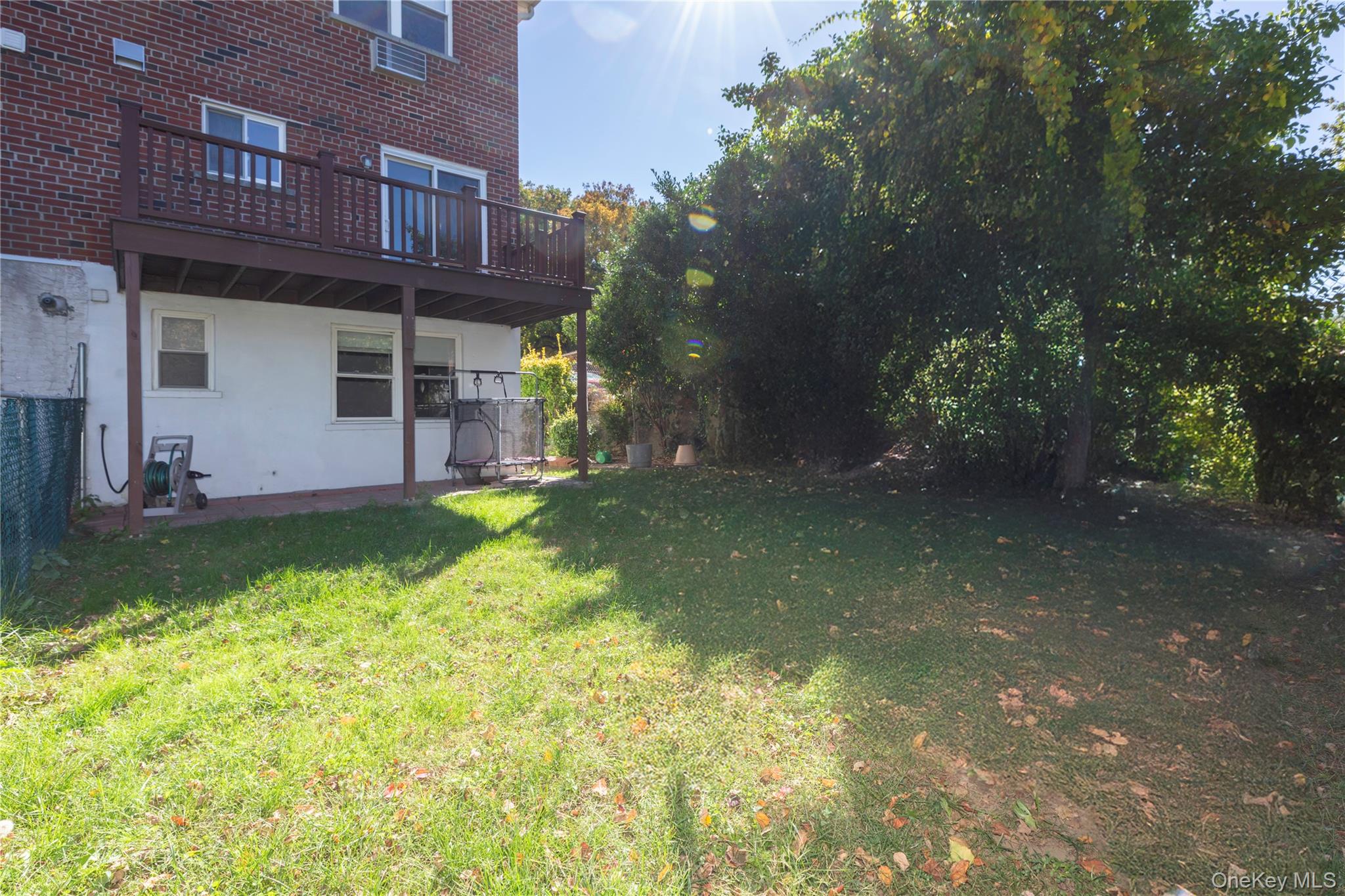 223 Ditmars Street Bronx, NY 10464 - Photo 26 of 28 a view of a house with a yard