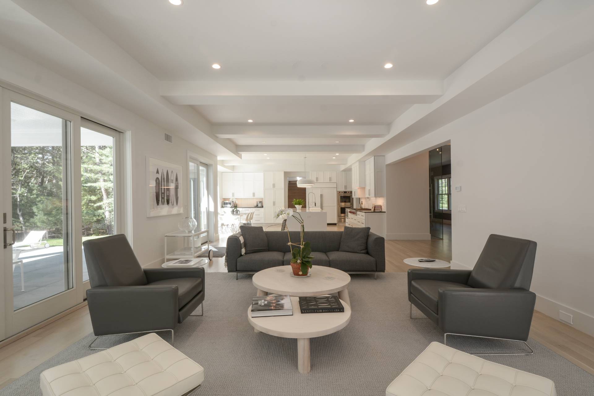 198 Bull Path East Hampton, NY 11937 - Photo 13 of 50 a living room with furniture and a large window