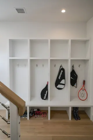 a view of storage and utility room with racks on the wall