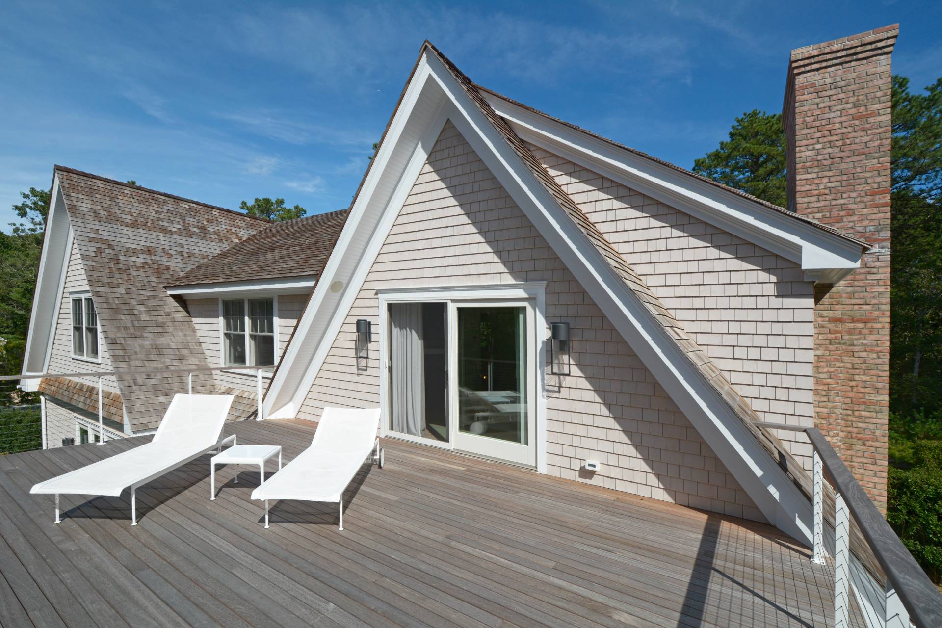 198 Bull Path East Hampton, NY 11937 - Photo 29 of 50 a view of deck with two chairs and wooden floor