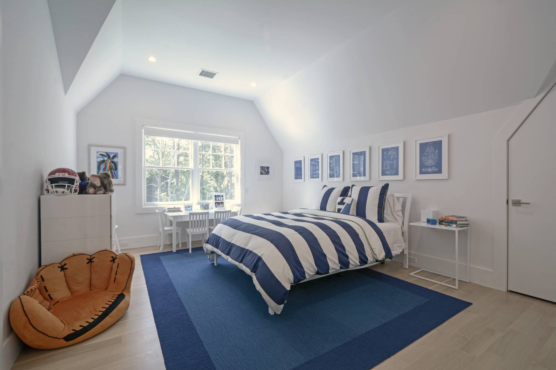 198 Bull Path East Hampton, NY 11937 - Photo 30 of 50 a bedroom with a bed and window