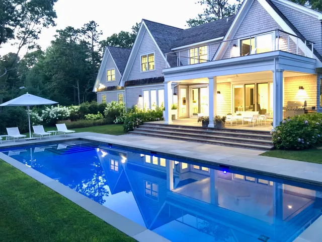 a view of a house with a swimming pool