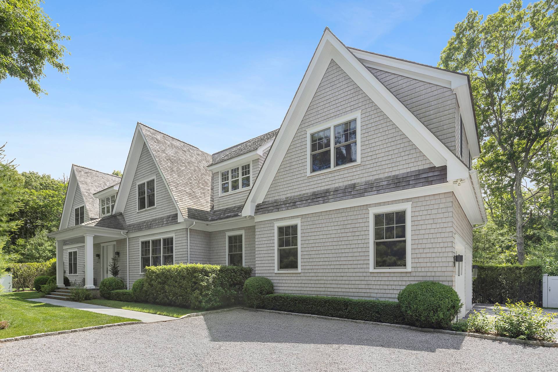 198 Bull Path East Hampton, NY 11937 - Photo 50 of 50 a front view of a house with a yard