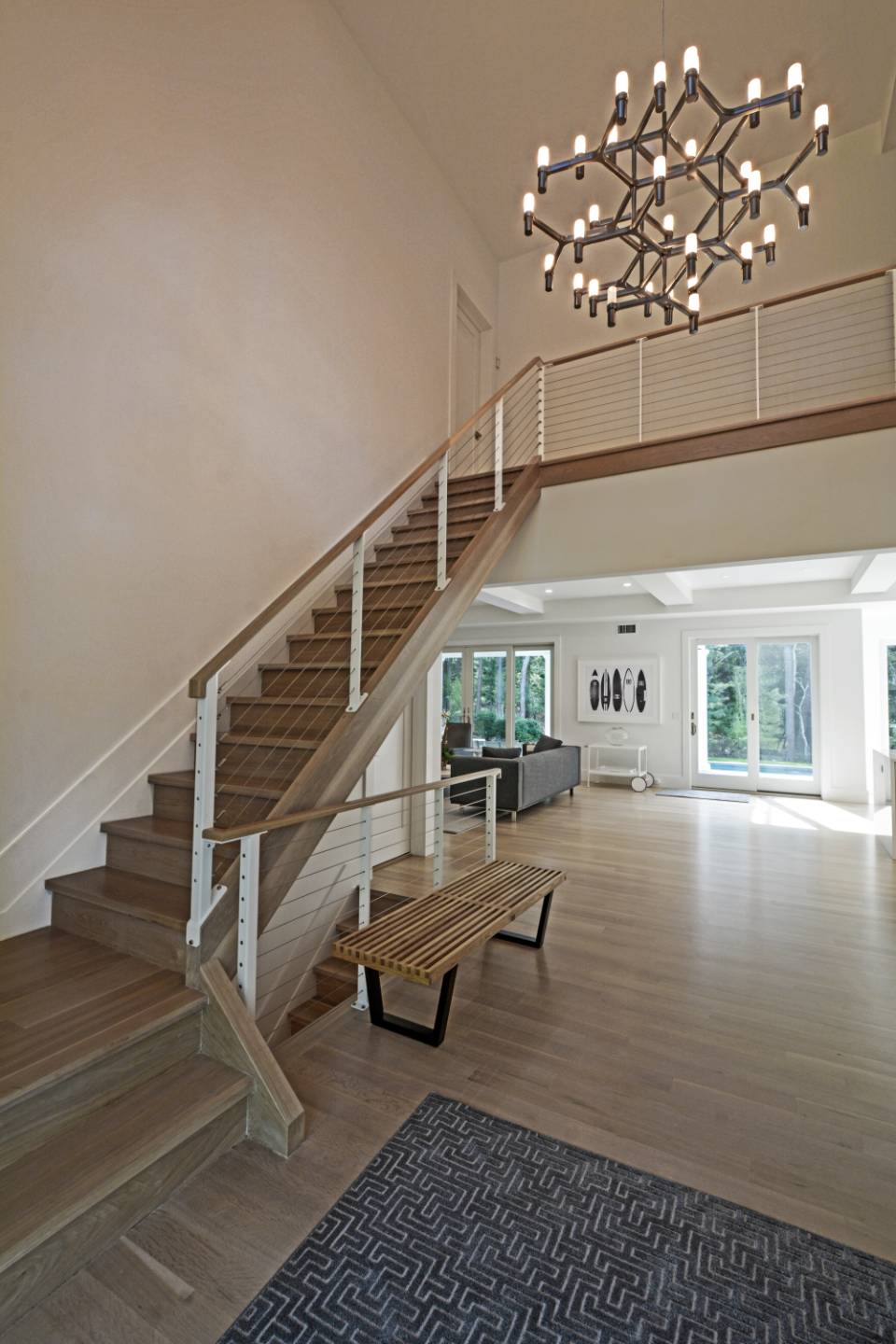 198 Bull Path East Hampton, NY 11937 - Photo 5 of 50 a living room with stairs