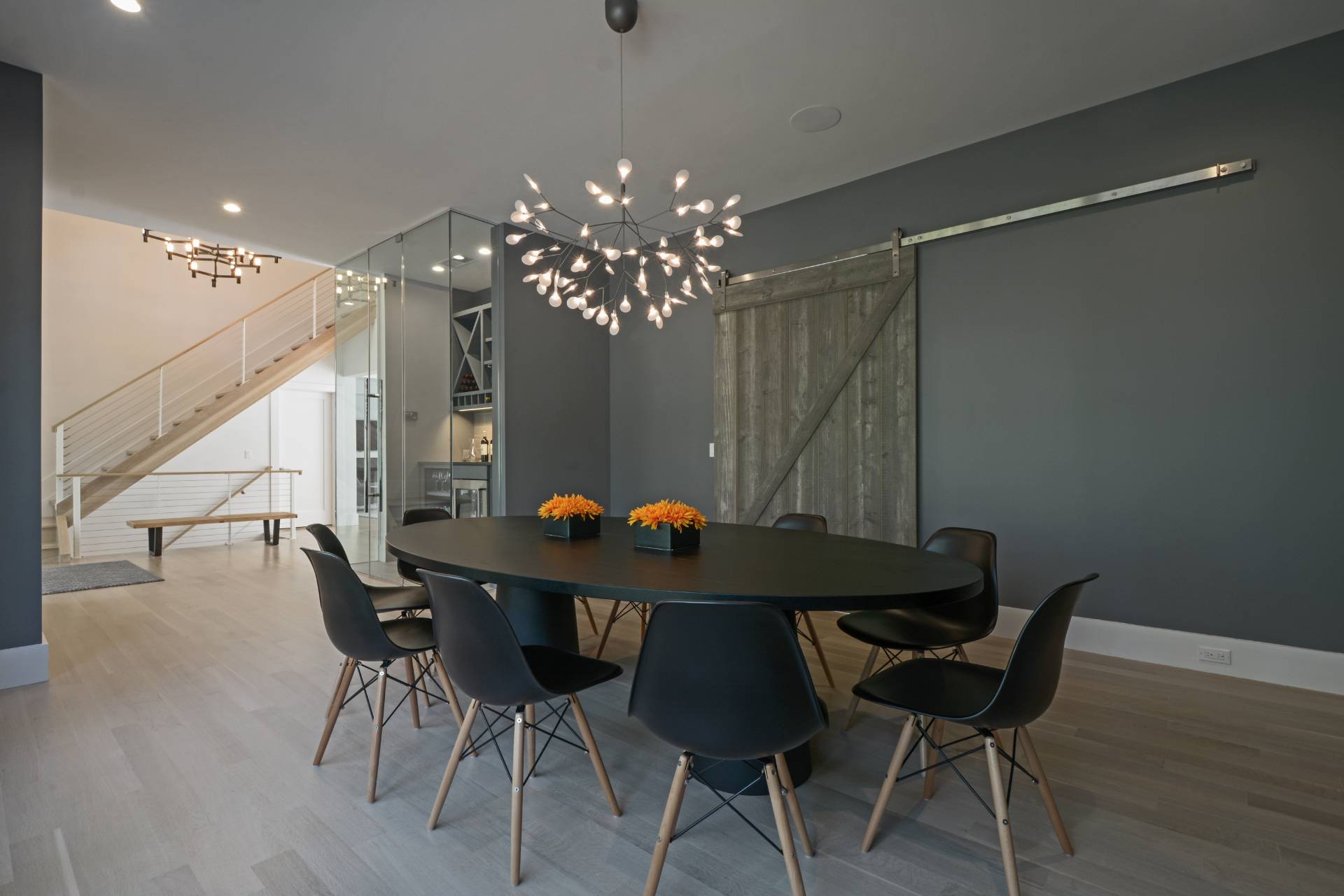 198 Bull Path East Hampton, NY 11937 - Photo 8 of 50 a dining room with furniture and chandelier